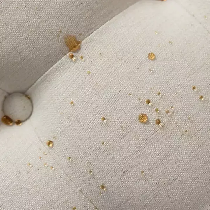 Round Ivory Cepheus Tufted Ottoman