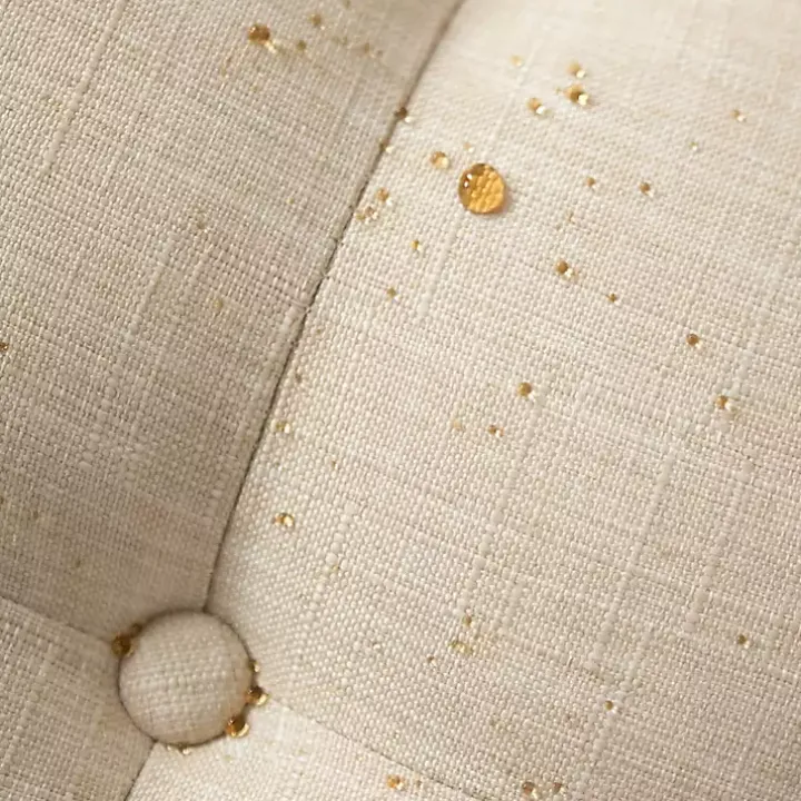 Round Tan Cepheus Tufted Ottoman