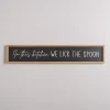 We Lick the Spoon Wall Plaque