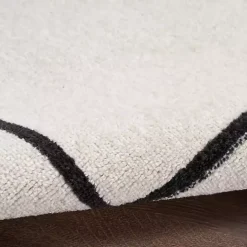 Ivory Bordered Indoor/Outdoor Area Rug, 5x7