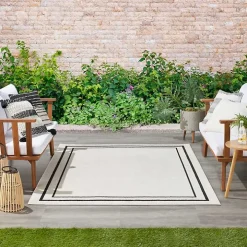 Ivory Bordered Indoor/Outdoor Area Rug, 5x7