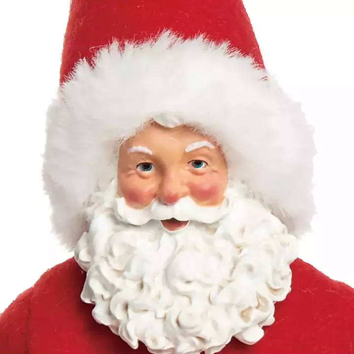 Santa in Pajamas Christmas Figurine