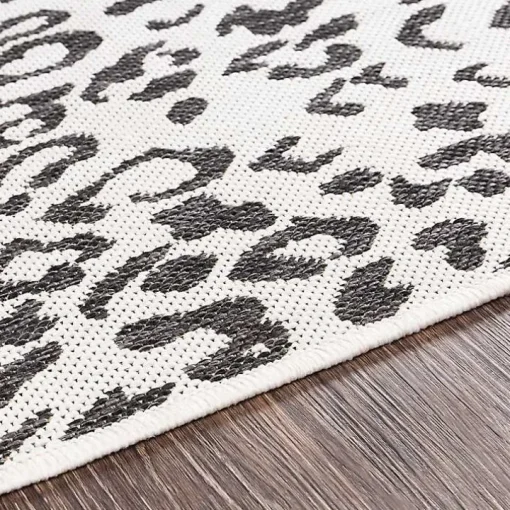 Cauli Black Leopard Print Round Outdoor Rug, 5 ft.
